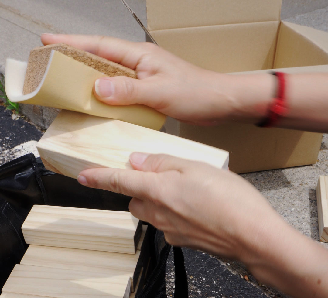 Canada-Day.00_00_19_11.Still001 Sanding a wood block. Wood preparation is key before applying wood stain.