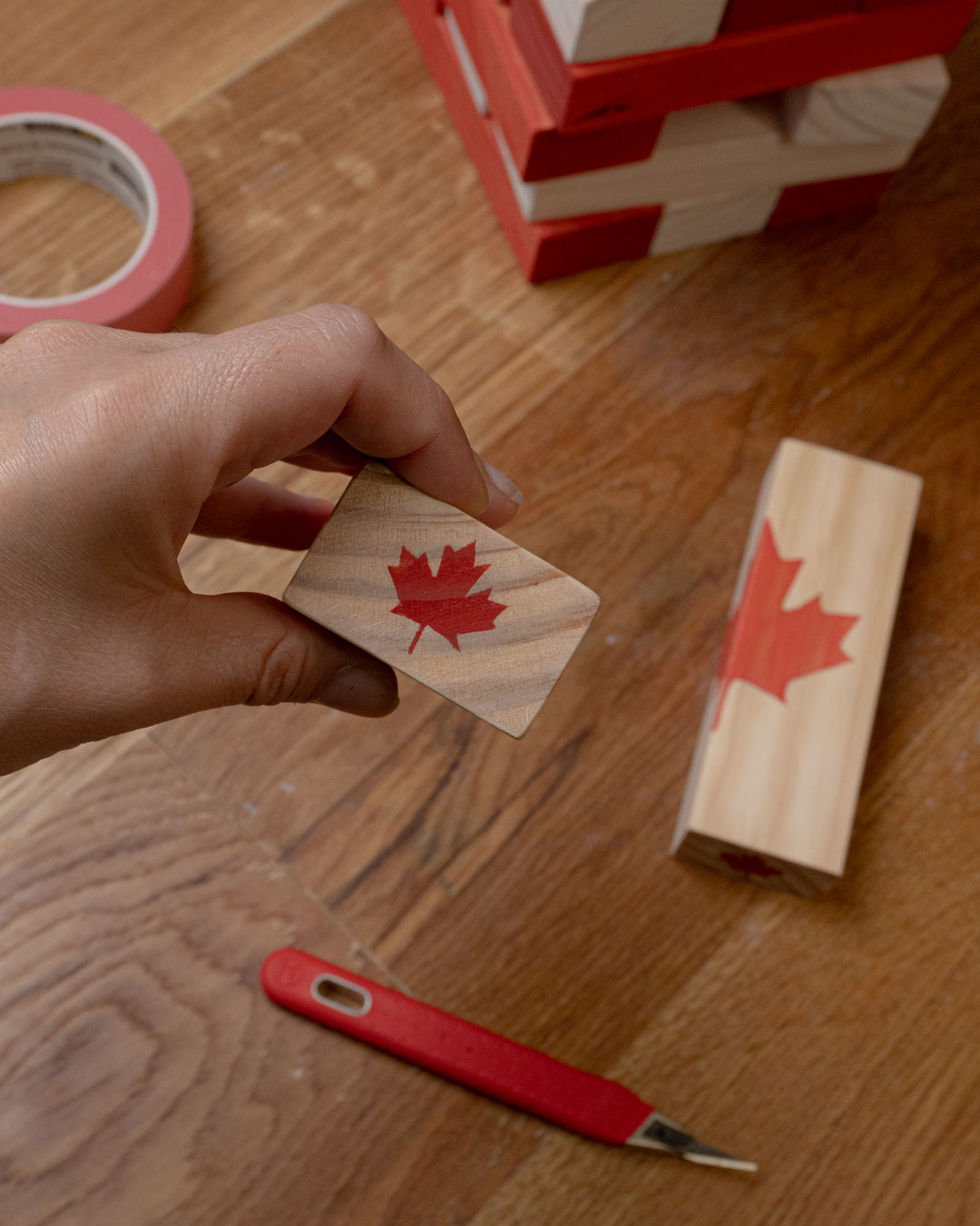 DSC00707-web A canada maple leaf stained on the end of a jenga block