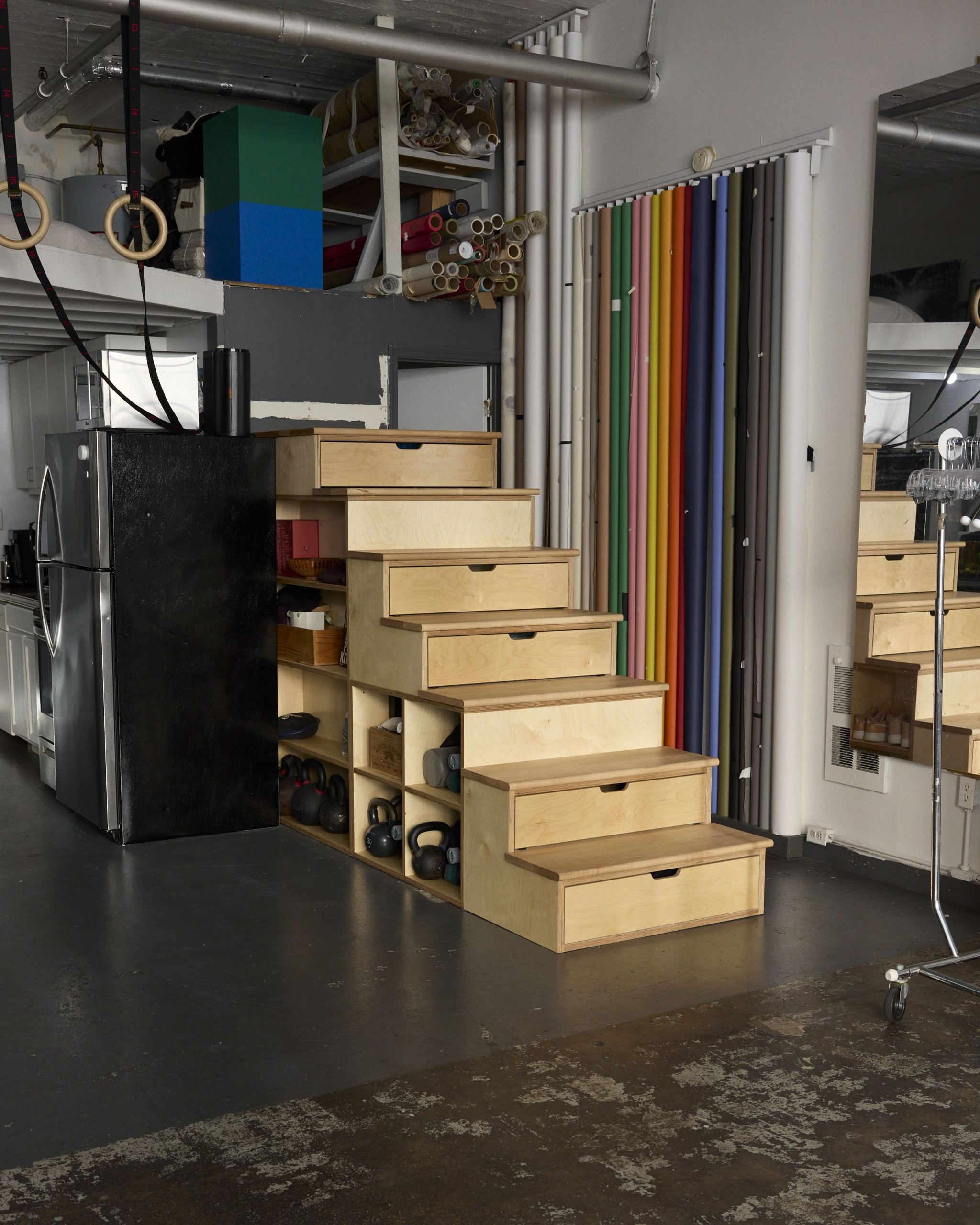 The custom stairs are for the photographer Jessup Deane in his live/work studio.