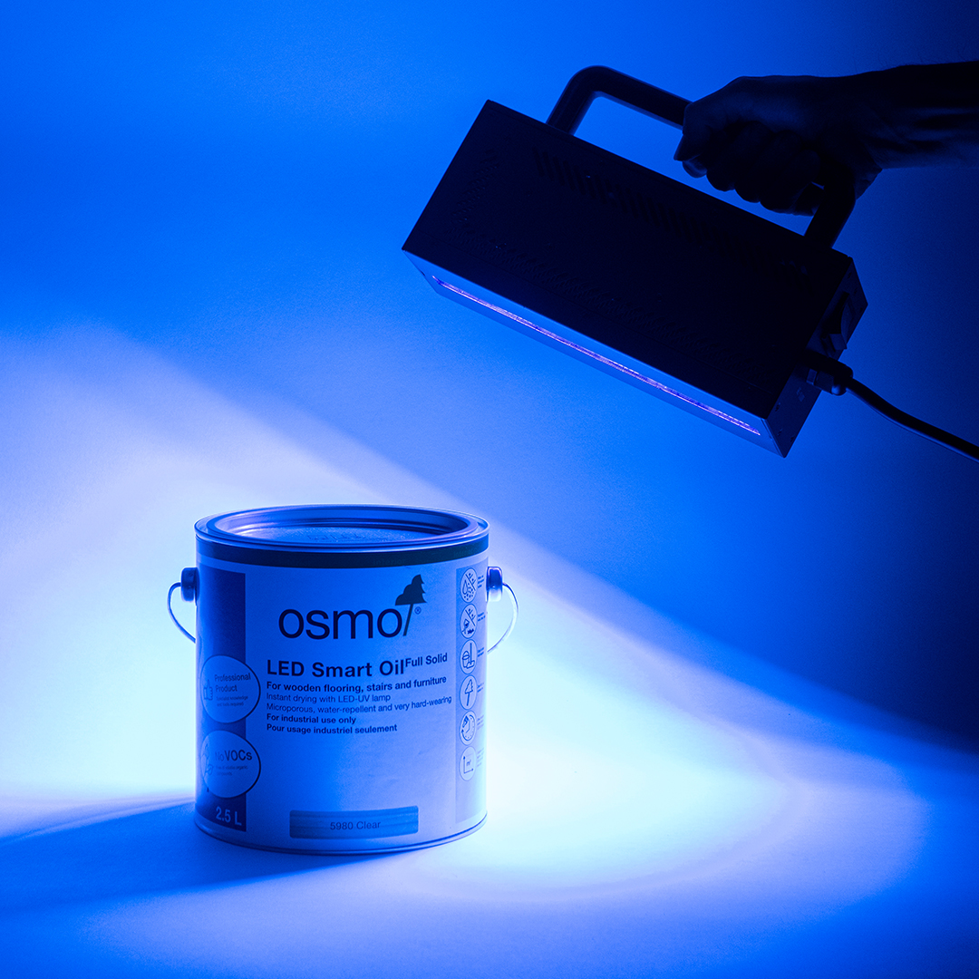 LED smart oil can under a blue UV light